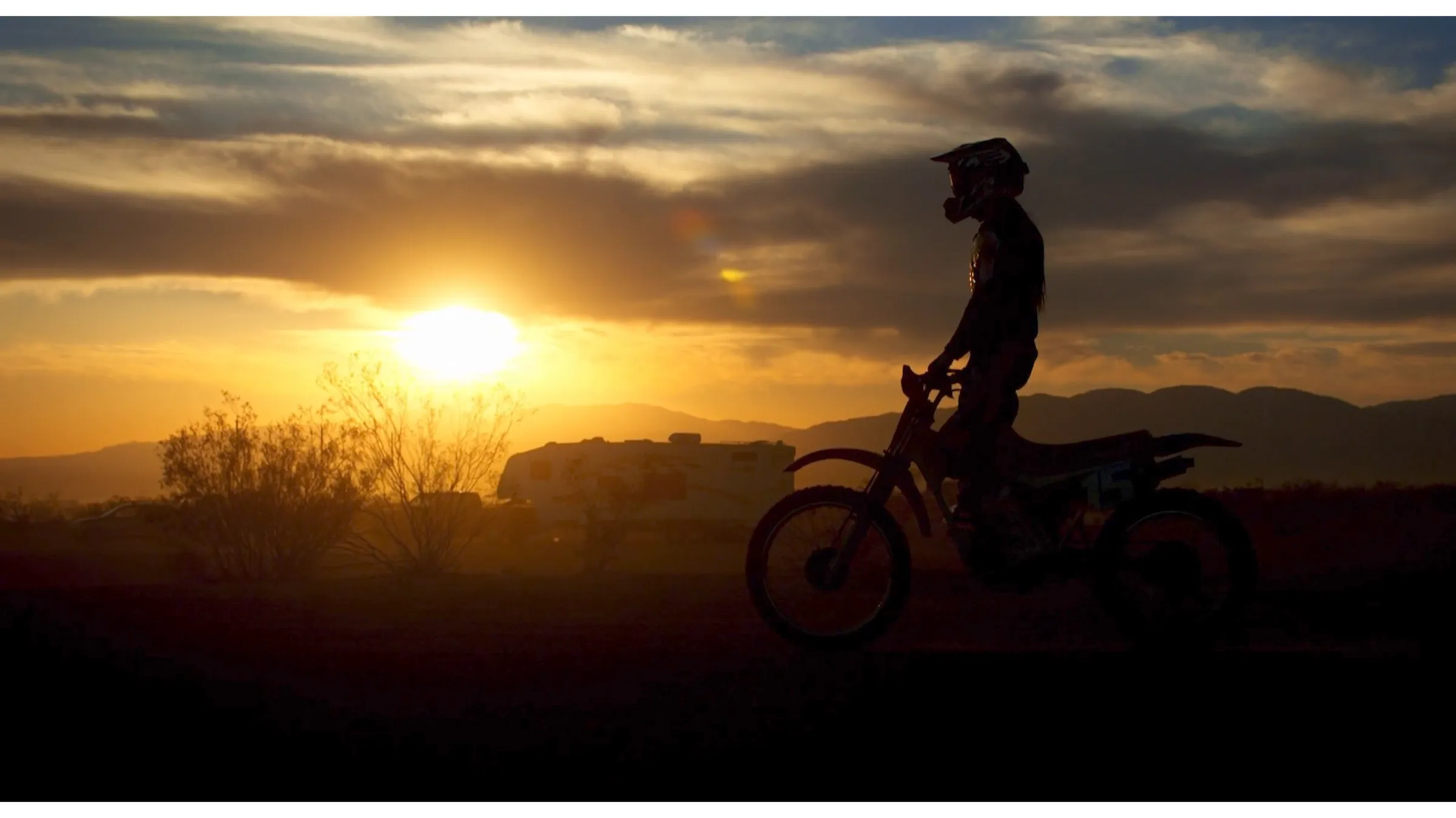 A rider silhouetted against a low sun, from the 2026 documentary reel